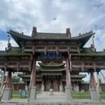 Ornate carved main gate of Bogd Khan Palace museum Ulaanbaatar — Naadam Festival Tour
