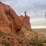 Red sandstone hoodoo at Flaming Cliffs Bayanzag Gobi Desert — Classic Mongolia Highlights