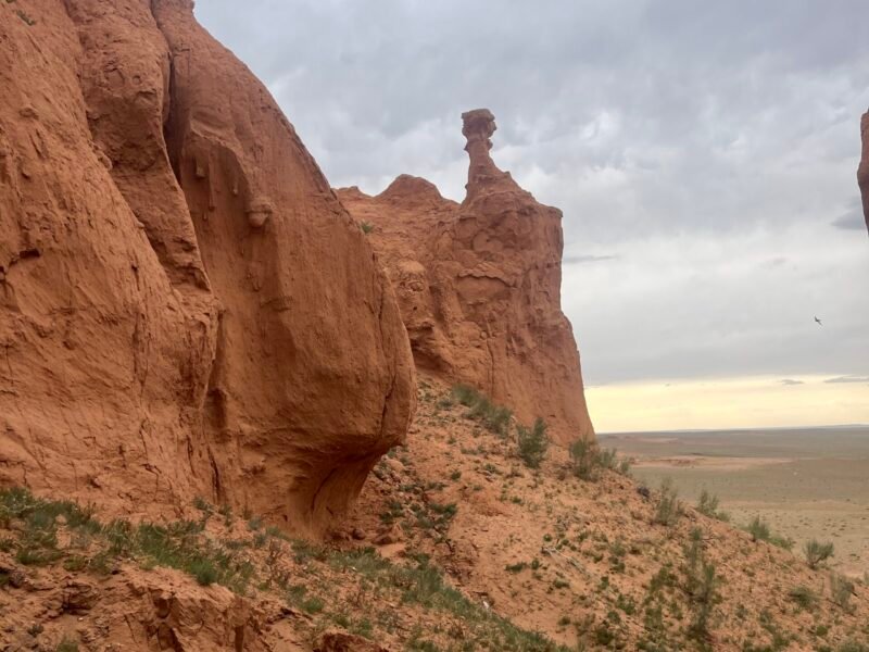 Red sandstone hoodoo at Flaming Cliffs Bayanzag Gobi Desert — Classic Mongolia Highlights