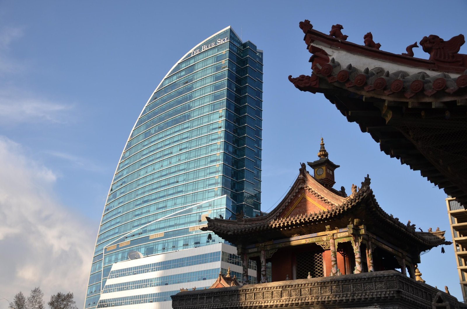 Ulaanbaatar city skyline showing Blue Sky Tower and Choijin Lama Temple -- Mongolia entry point for international travelers