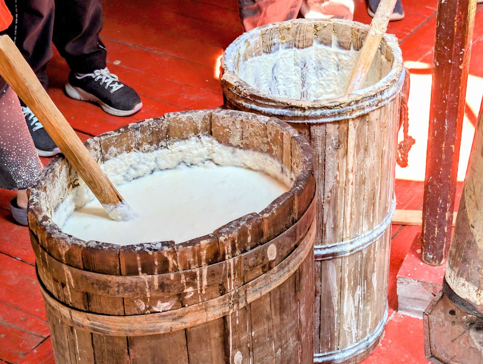 Wooden barrels of airag fermented mare's milk being churned -- the traditional Naadam Festival drink in Mongolia