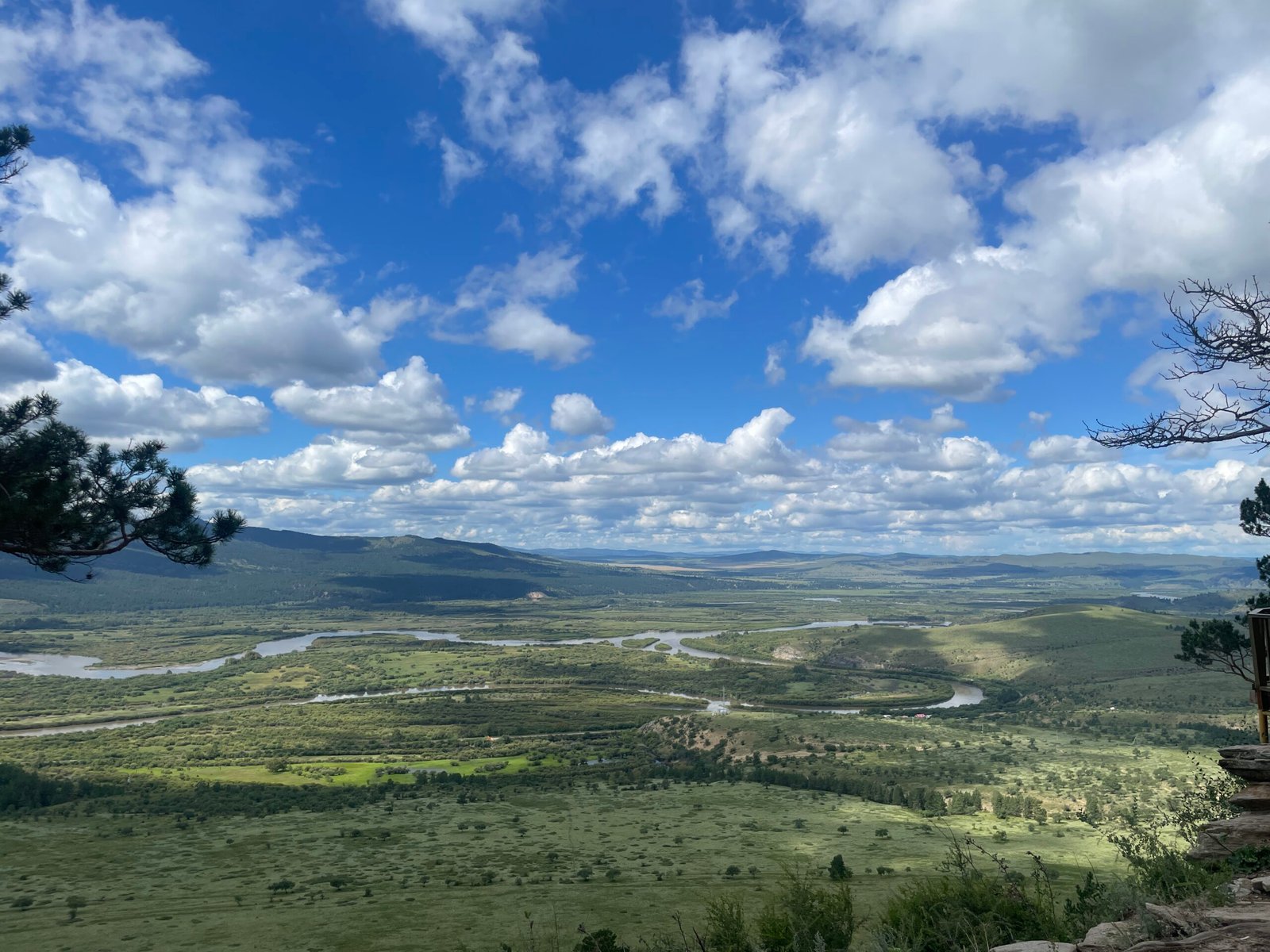 Orkhon Valley river winding through steppe seen from hilltop Mongolia