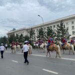 Traditional horsemen parade at Naadam Festival Ulaanbaatar — Mongolia Family Adventure Tour