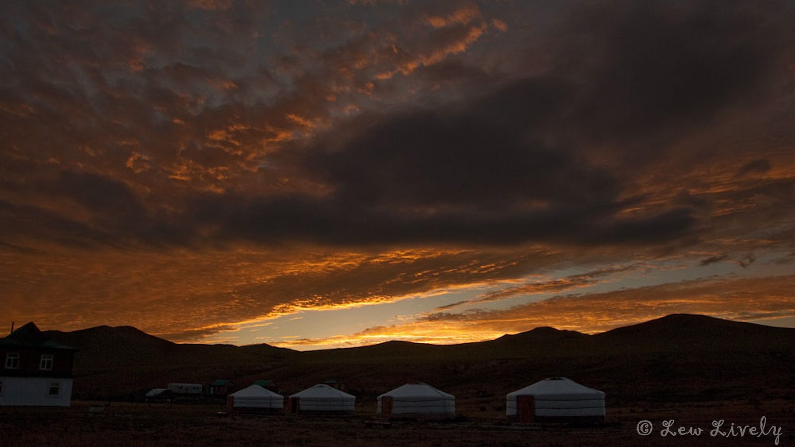 Ger camp sunset steppe Mongolia countryside